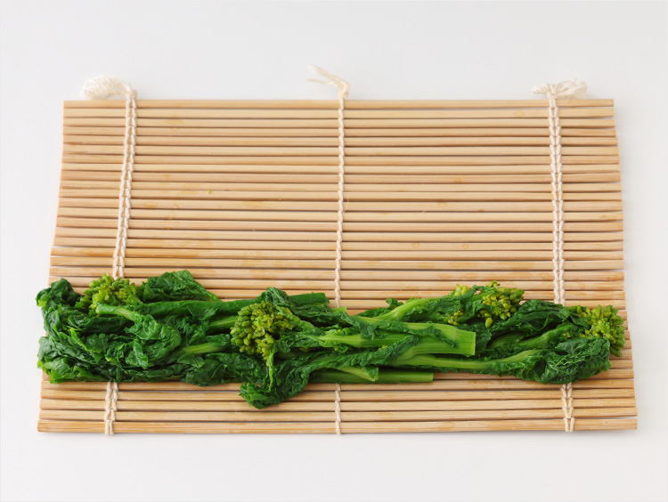 菜の花を卷きすにおいたイメージ